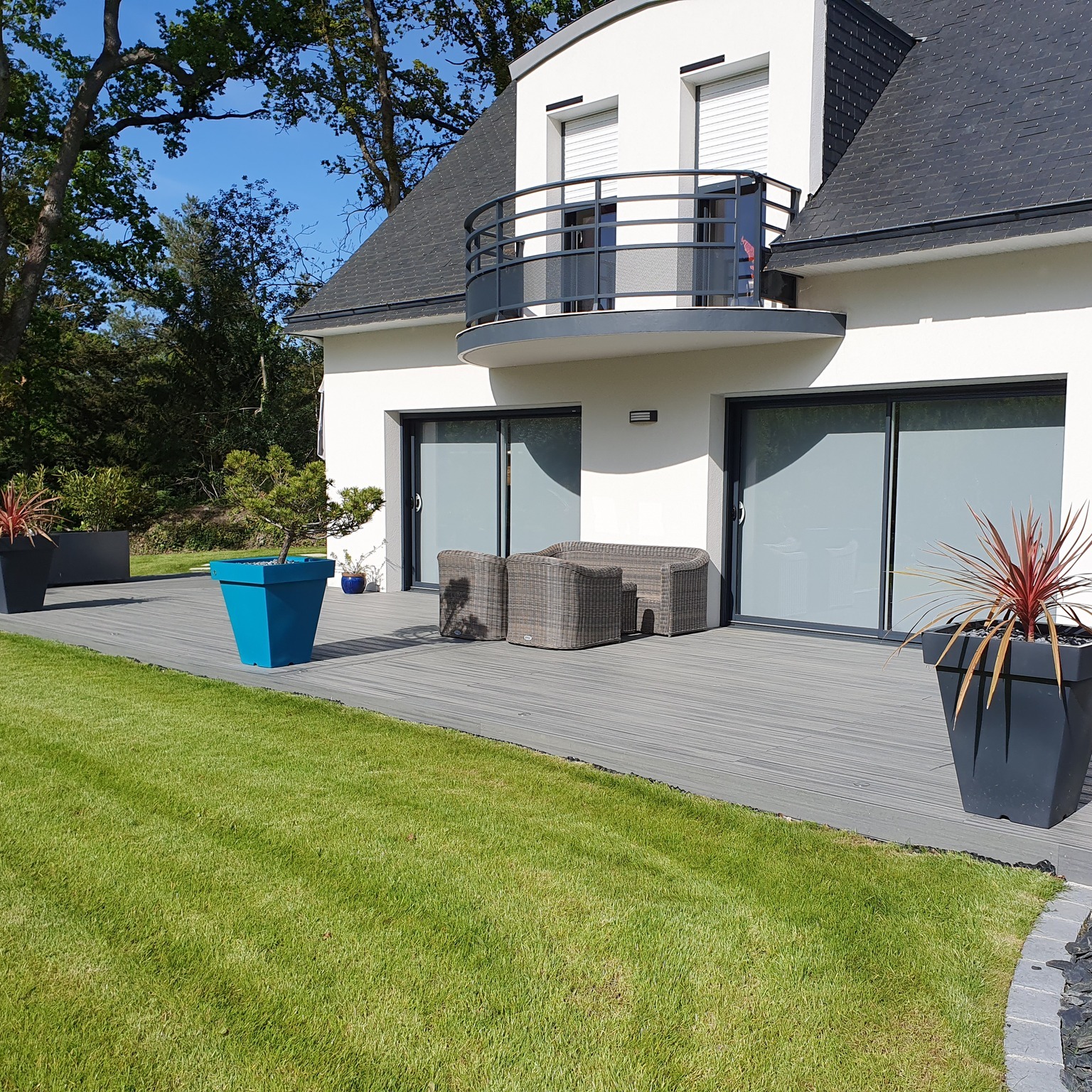 Réalisation d’une terrasse en Trex Island Mist ave…